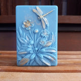 blue dragon fly goats milk soap scented with plumeria and gilded with gold mica