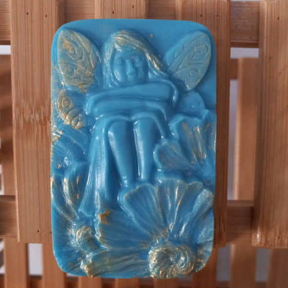 blue fairy plumeria scented goats milk soap gilded with gold mica