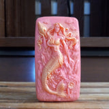 light red hot pink mermaid and seashells goats milk soap scented with red poppy fragrance and dusted with gold mica