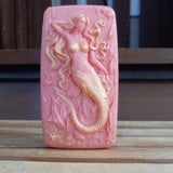 light red hot pink seaweed serenity mermaid goats milk soap scented with red poppy and dusted with gold mica