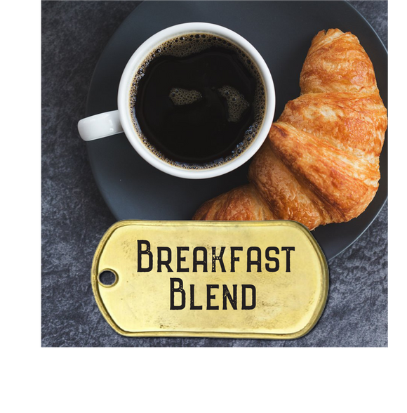 Breakfast blend coffee with cup of coffee and croissant. Choose whole bean, standard and espresso grind 