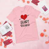 Heart breaker pink tshirt with cracked red heart with an arrow through it