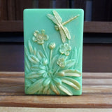 green and gold dragonfly goats milk soap scented with cucumber melon
