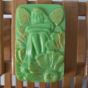 green fairy and wildflowers goats milk soap scented with cucumber melon and brushed with gold mica