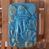 blue fairy plumeria scented goats milk soap gilded with gold mica