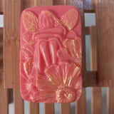 light red hot pink fairy with wildflowers goats milk soap scented with red poppy fragrance and gilded with gold mica