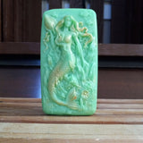 green mermaid and seashells goats milk soap scented with cucumber melon and brushed with gold mica