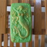 green seaweed serenity mermaid goats milk soap scented with cucumber melon and brushed with gold mica
