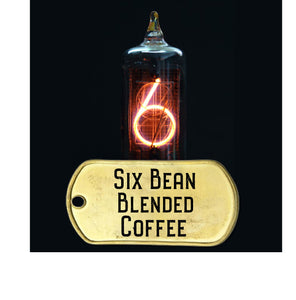 six bean blended coffee, dark roast, pictured with vacume tube and neon glowing number six