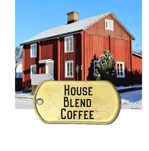 House blend coffee with bacckground picture of swedish red house and snow