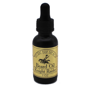 Knight raider beard oil in 1 ounce blacck bottle scented with night blossoms spice and victory