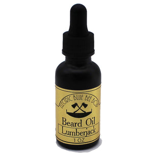 Lumberjack beard oil scented with forest pine and citrus in black one ounce bottle