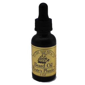 Pirates Plunder beard oil in 1 ounce black bottle scented with rum tobacco and allspice