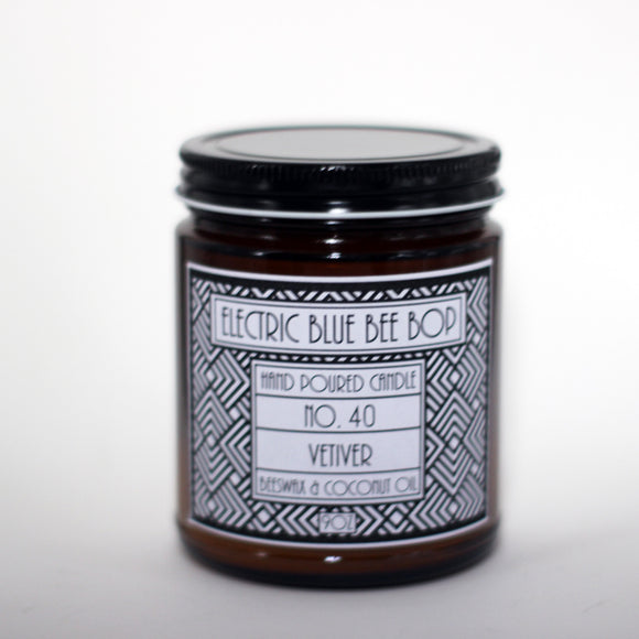 vetiver scented beeswax candle with art deco label in black and white