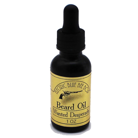 wanted desperado beard oil in black one ounce bottle scented with cedar blossom sandalwood and patchouli