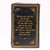 alice in wonderland handbag clutch that looks like a book in black and gold 