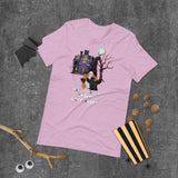 batty catty gnome lilac tshirt with gnome in wizard hat holding cat with batwings and a haunted house