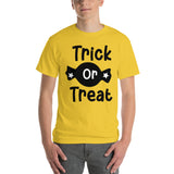 trick or treat black lettering yellow t shirt for halloween with wrapped candy