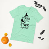 witches gotta stick together black lettering on aqua tshirt with witch hat and broomstick