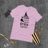 witches gotta stick together black lettering on lilac tshirt with witch hat and broomstick
