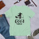 good witch aqua tshirt with black lettering and a witch riding a broom